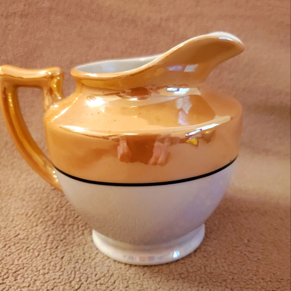 Vintage orange luster open creamer